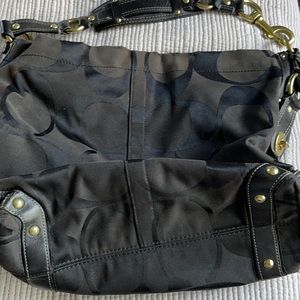 Classic “C” Coach shoulder bag.  This one was lovingly used!